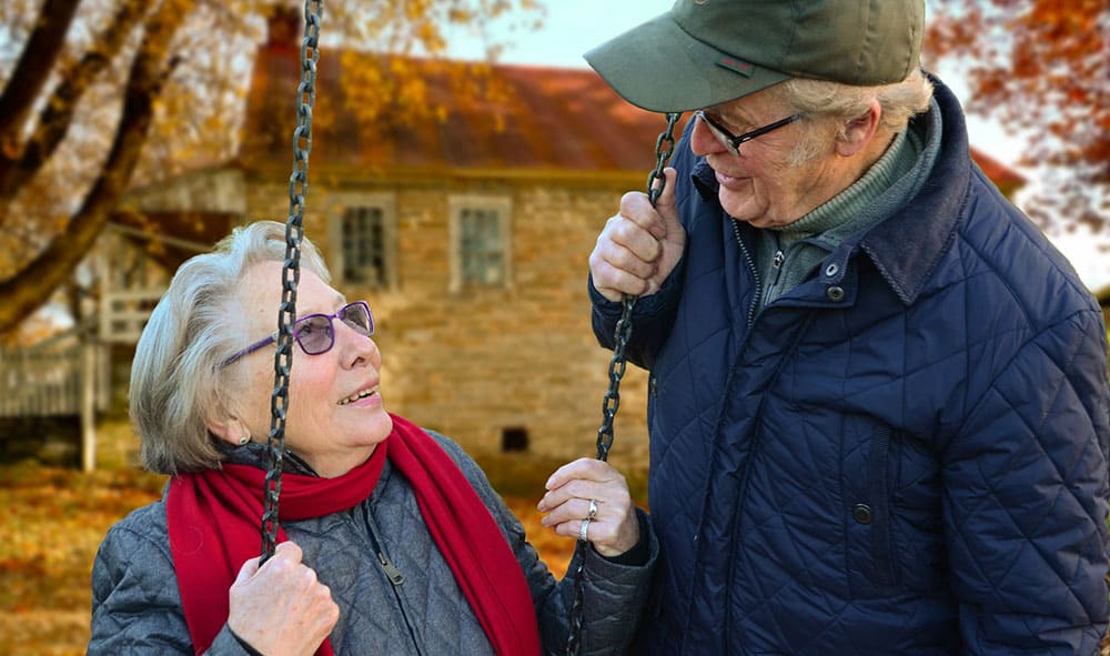 old people happy on swing ageing better