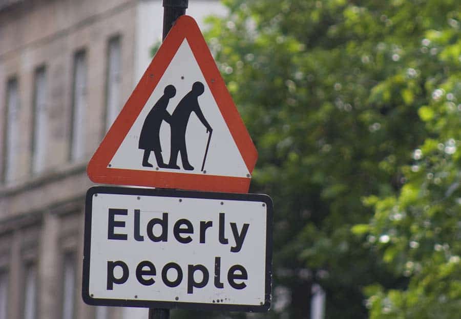 elderly people crossing sign