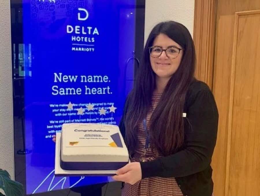 Caroline Alexander (Human Resources Manager) celebrates Delta Hotels by Marriott Swindon becoming the 100th organisation to sign the pledge.