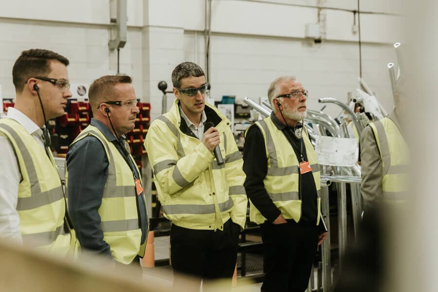 UK Operations Director Richard Saunders (centre) leading the factory visit